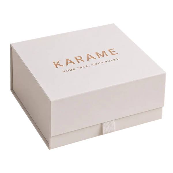 The KARAME presentation box, white with rose-gold foil lettering